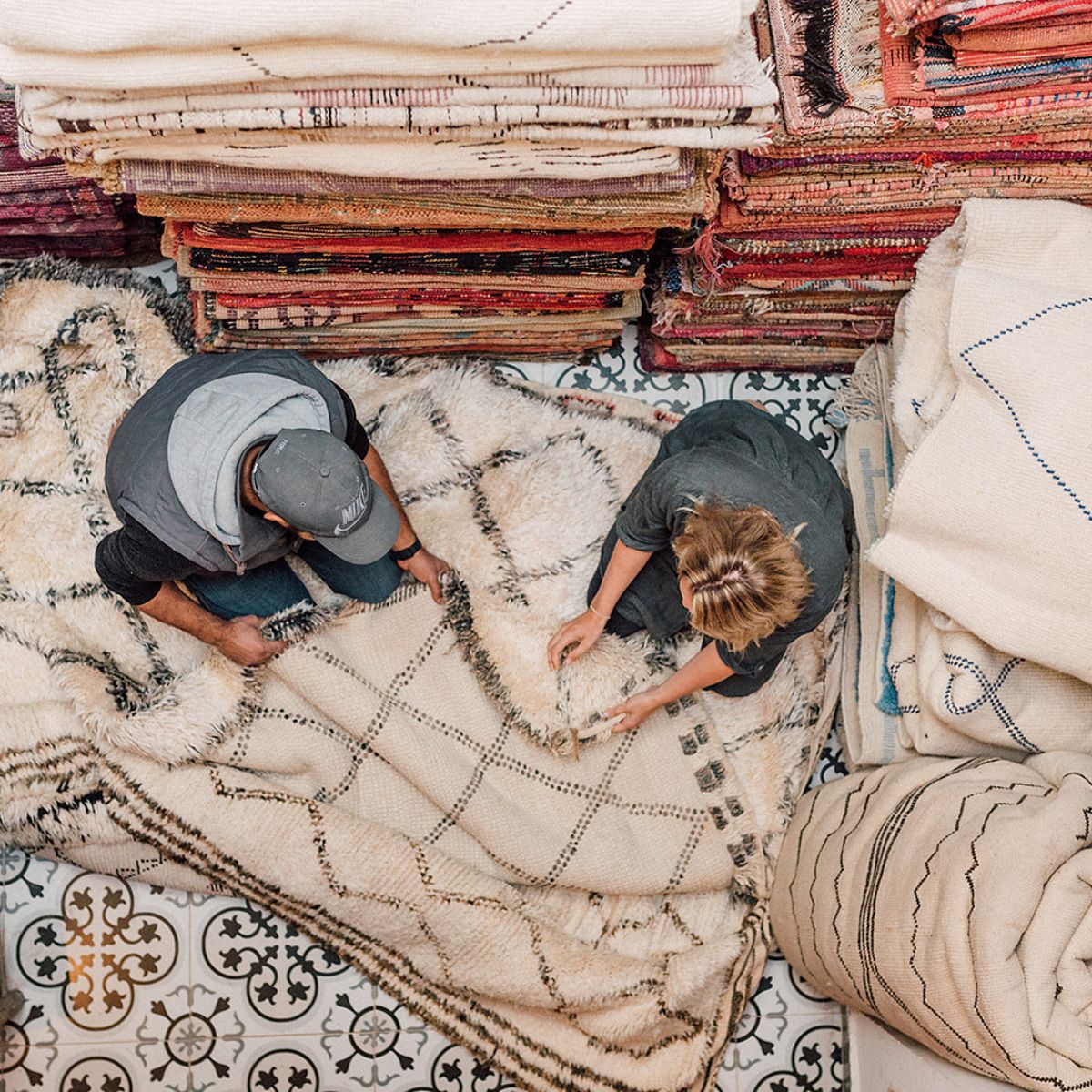 Cream and black Moroccan rugs and carpets arial shot - Nouvelle Nomad