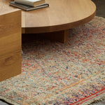 Beni MGuild Rug under a circular timber coffee table - Nouvelle Nomad