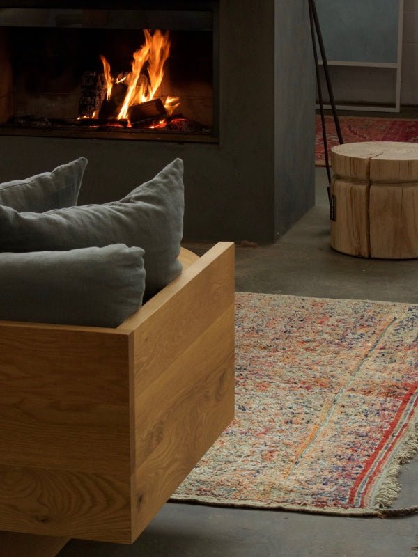 Beni MGuild rug in front of a fire place - Nouvelle Noamd